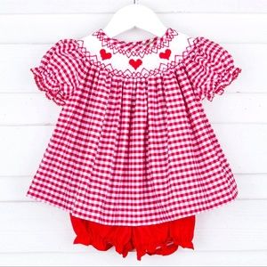 classical whimsy. worn once for pictures.  Smocked heart outfit with bloomers.
